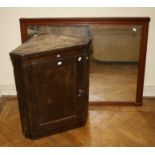 A small 19th century elm single door hanging corner cupboard, together with a mahogany framed rectan