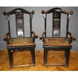 A pair of 19th century Chinese elm 'Official's Hat' armchairs. 54.5 cms (top of seat).