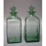 A pair of 19th century Dutch mallet form decanters, each wheel etched with sailing vessels and