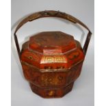 A late 19th / early 20th century Chinese painted hexagonal softwood food container, gilt decorated