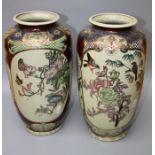 A pair of modern Chinese satsuma-style vases, each decorated with reserves of blossoming trees,