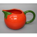 A Portuguese tomato soup jug by Santos, modelled as the fruit, with loop handle 14 x 23 cms.