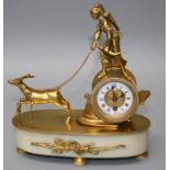 A late 19th century gilt metal and alabaster boudoir timepiece, the drum cased eight day movement