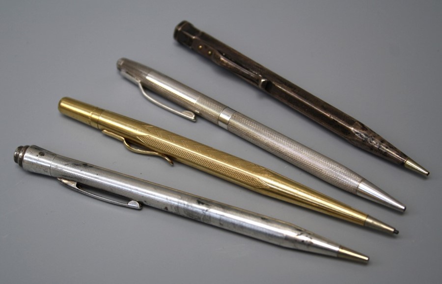 A collection of  20th century three silver and one rolled gold propeling pencils. (4)