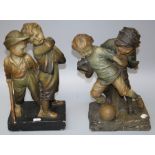 A 1920s probably Austrian painted terracotta figure group of street urchins playing soccer.