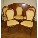 A parquetry veneer oval extending dining table with two extra leaves on cabriole legs together