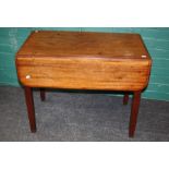 A 19th century mahogany pembroke table, the rectangular top and flaps with moulded edge over end