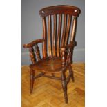 A 19th century beech and elm Nottingham type lath back armchair.