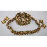 A suit of vintage gilt metal jewellery of bead and flattened ropework form. The suite comprising
