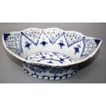 A 20th century German porcelain onion pattern bread basket. Cross swords mark to base. 11.5 x 30