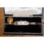 Rolex. A ladys 18ct gold wristwatch, the rectangular dial with Arabic numerals, the 18ct gold cast