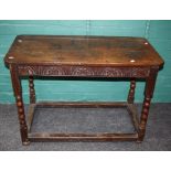 An 18th century and later oak side table, the rectangular planked top over demi-lunette carved