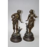 A pair of French early 20yth century zinc spelter figures after Bruchon of "PAPILLONNEUSE and her