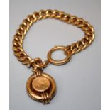 A hollow curb pattern link bracelet with over sized jump ring and suspensory pendant with