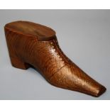 A large Victorian style treen snuff box fashioned as a boot with gold coloured pique detail. 14