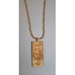 A 9ct gold ingot pendant