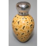 Saunders and Shepherd, a silver mounted porcelain egg shape scent bottle with speckled decoration on