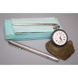 Tiffany and Co, a Stirling silver ballpoint pen, boxed with felt case, a Dunhill engine turned