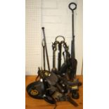A collection of antique and vintage wrought iron and brass hearth tools and associated items