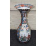 A large Japanese Meiji period porcelain floor vase of baluster form with a flared and crimped rim.