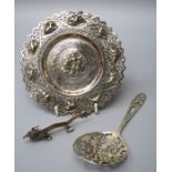 A Japanese cast and pierced silver cabinet spoon with scenes of crysanthemum. together with a