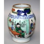 An early 20th century Chinese famille verte baluster porcelain vase, decorated with figures in an