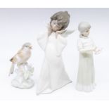 Lladro figure of an angel and two similar Lladro figures