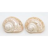A pair of early 20th Century carved mother of pearl shells with names etched within
