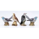 Four Beswick bird figures, including a pair of cuckoos, number 2315, a Beswick lesser spotted