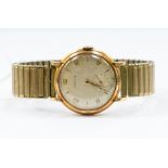 Longines- a  9ct gold gents Longines wristwatch, gold tone dial with applied old tone number and