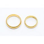 Two 22 carat gold wedding bands, 4mm and 5mm, sizes J and P1/2, combined total weight approx 11gms