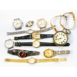 A collection of watches to include a eight ladies dress watches and four gents watches/watch faces
