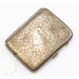 A George V silver cigarette case, Birmingham 1913, scrolled foliage decoration to front and back,