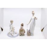Three boxed Lladro figures including May Flowers