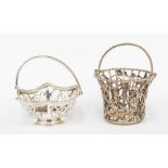 A George V silver wirework bon bon basket, ropetwist handle above cast and applied with trailing
