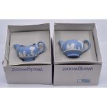 A collection of boxed Wedgwood Jasper ware including teapot, tea cups, saucers, vases, pin dishes,