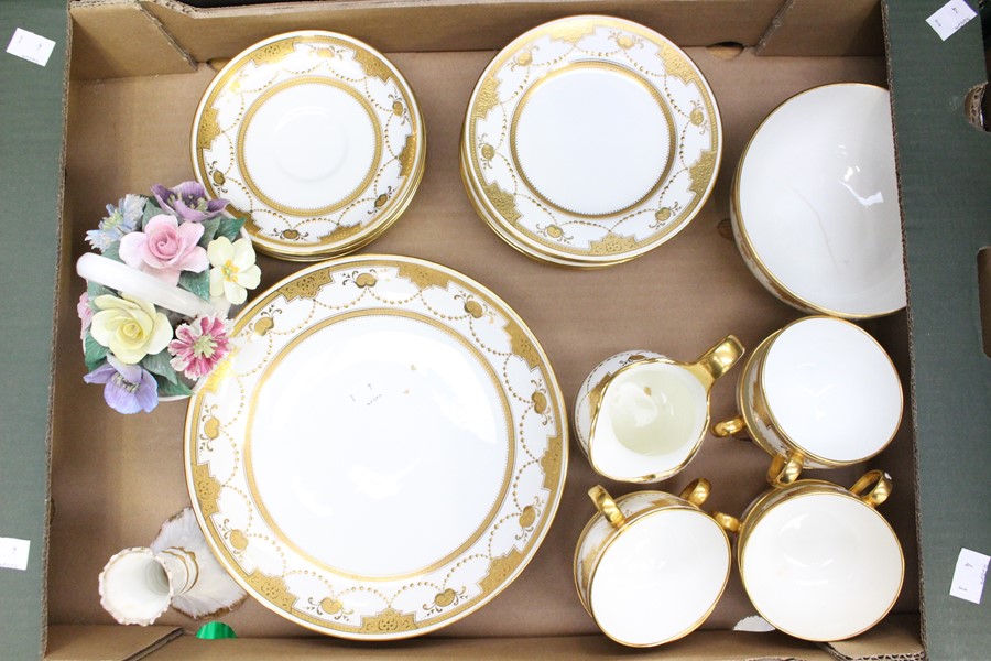 A collection of Mintons white and gold tea wares, plates, tea cups, saucers, etc with Crown