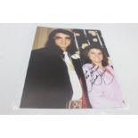 Priscilla Presley with Elvis - signed by Priscilla