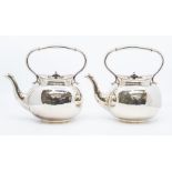 A pair of Sheffield plated tea kettles, with raised beaded rims, mushroom shaped ebony finials,