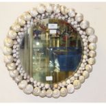 An early 20th Century round shell wall mirror