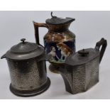 A pewter Art & Crafts craftsman planished teapot, of oblong octagonal form, together with a lidded