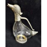 A collection of 20th Century cut glass decanters, claret jugs and other glass wares (Q)