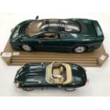 A Maisto Jaguar XJ220, 1992, scale model 1/12, racing green, fitted on a plinth stand, together with