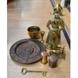 A collection of assorted brass ware including a large figural fireside companion set, a large bronze