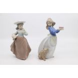 Two Nao figures of young ladies