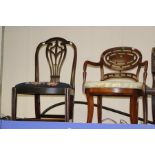 A George III mahogany side chair, circa 1800, with a pierced back splat, shaped front seat rail,