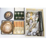 A collection of plated items including boxed bread knife, mother of pearl plated cup and saucer,