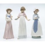 Three Nao figures of young ladies