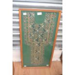 A near Eastern silk embroidered garment fragment 36x71cms approx