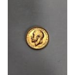 George V, 1911 Full Sovereign, high grade. Condition, wear to high points with small scratches.